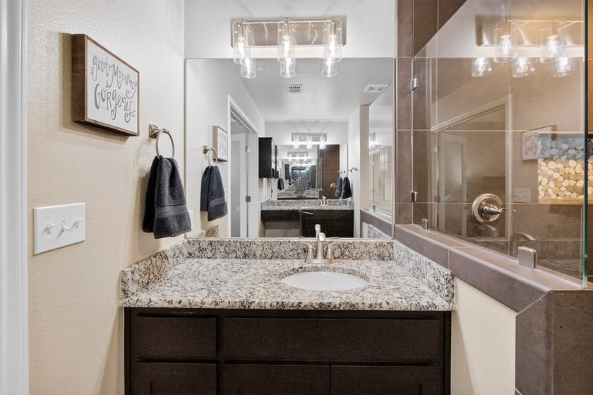 Welcome to Coastal Wild Wood, y'all! This 4-bedroom, 3-bath - photo 15