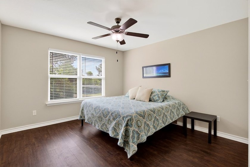 Welcome to Coastal Wild Wood, y'all! This 4-bedroom, 3-bath - photo 21