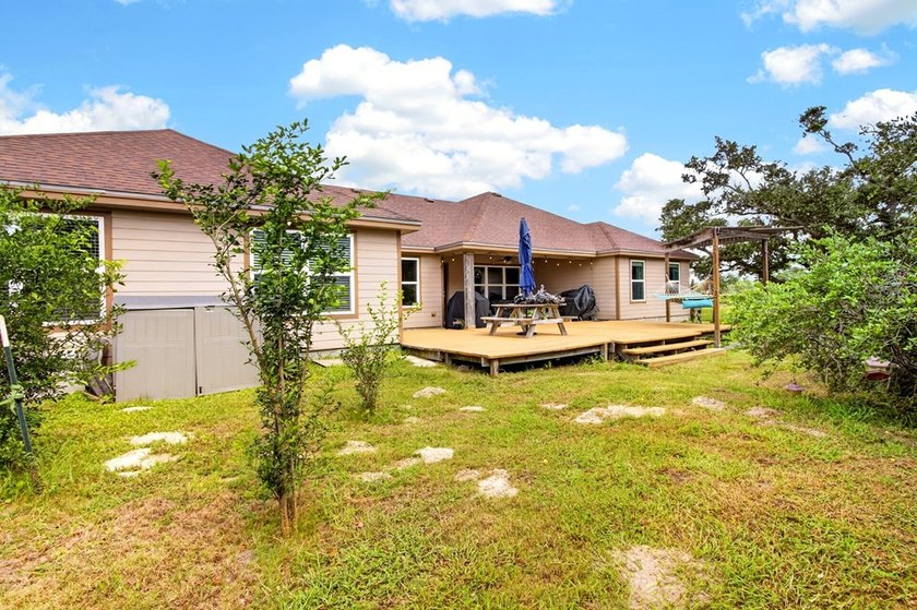 Welcome to Coastal Wild Wood, y'all! This 4-bedroom, 3-bath - photo 30