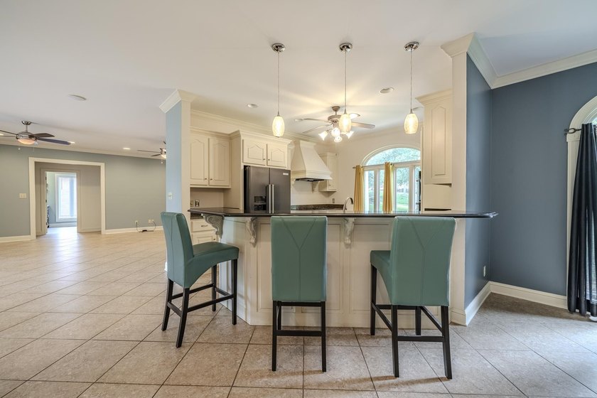 Welcome to this beautiful brick home perfectly situated on the - photo 13