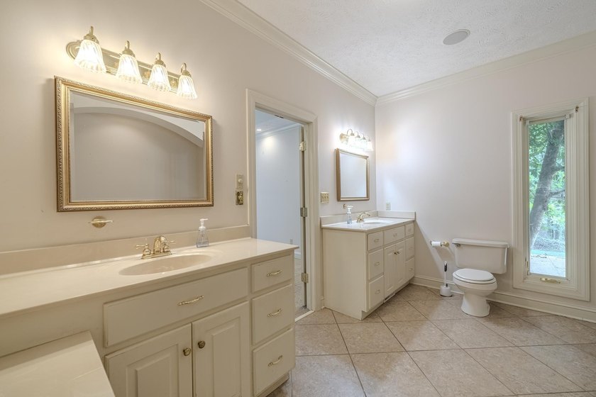 Welcome to this beautiful brick home perfectly situated on the - photo 17