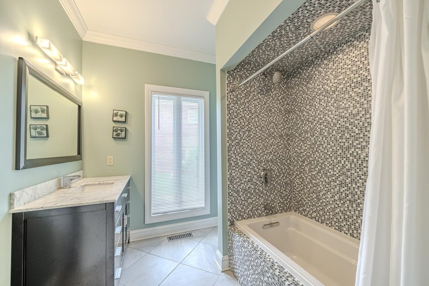 Welcome to this beautiful brick home perfectly situated on the - photo 24