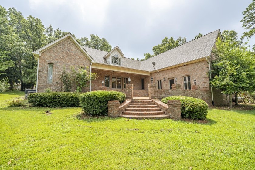 Welcome to this beautiful brick home perfectly situated on the - photo 30