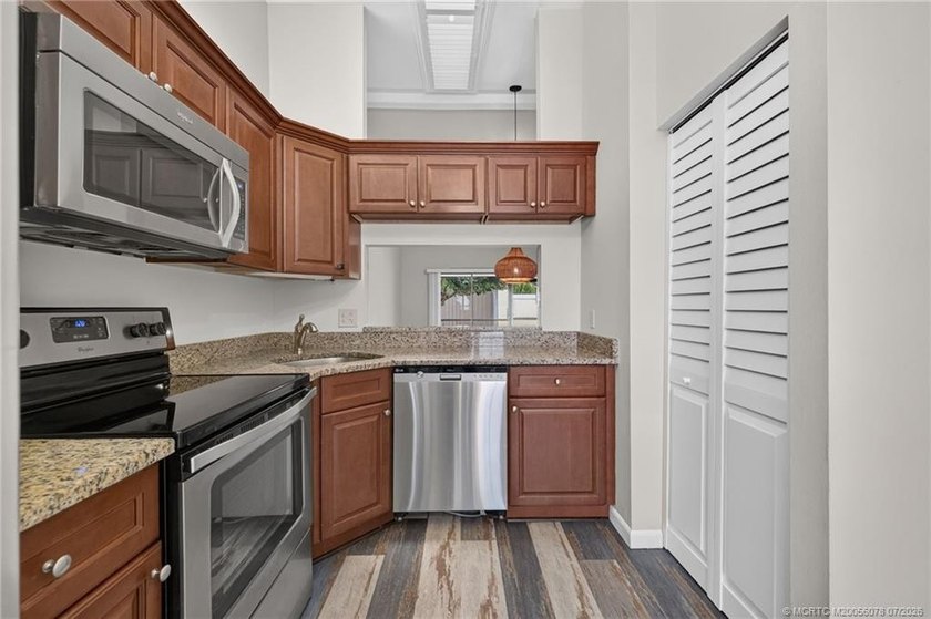 Beautifully updated villa in the centrally located community of - photo 8