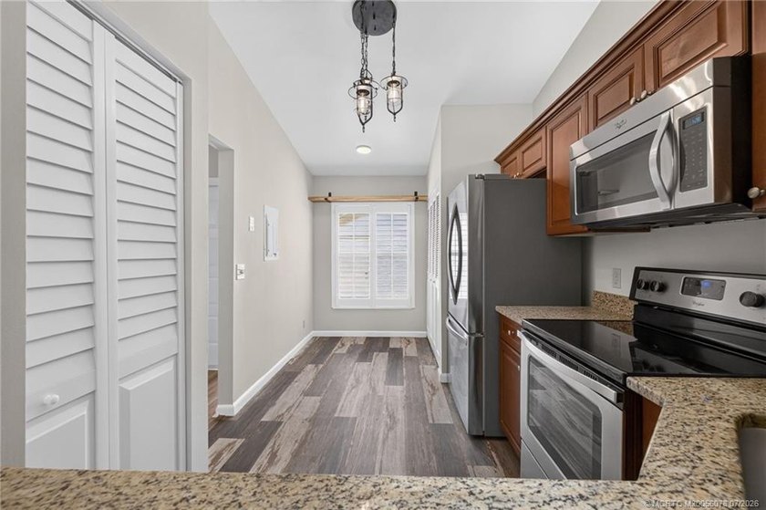 Beautifully updated villa in the centrally located community of - photo 9