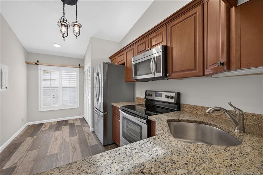 Beautifully updated villa in the centrally located community of - photo 10