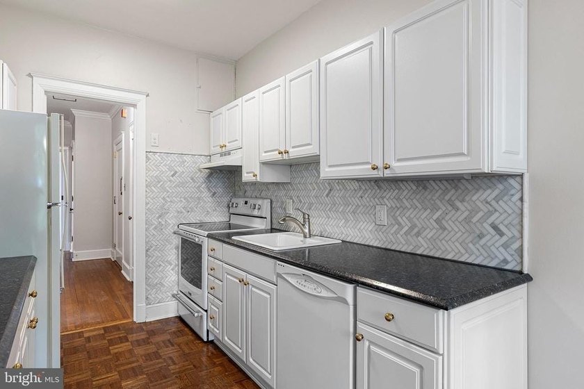 This corner unit is located on the top floor of the historic - photo 11