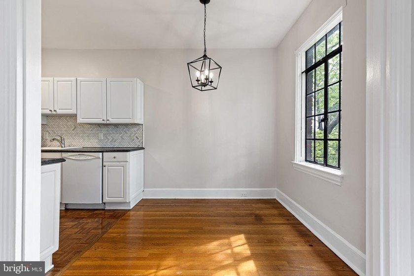 This corner unit is located on the top floor of the historic - photo 14