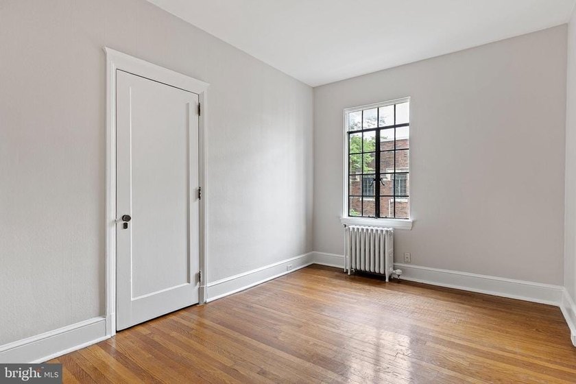 This corner unit is located on the top floor of the historic - photo 17