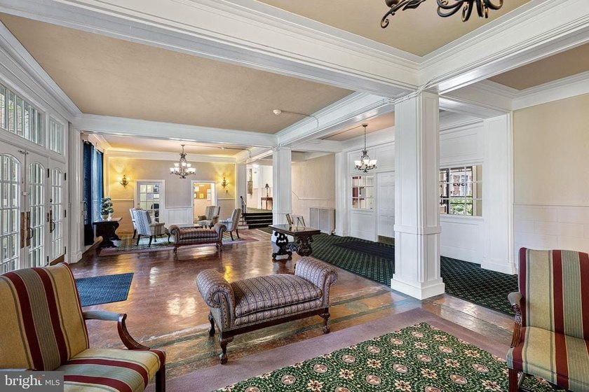 This corner unit is located on the top floor of the historic - photo 27
