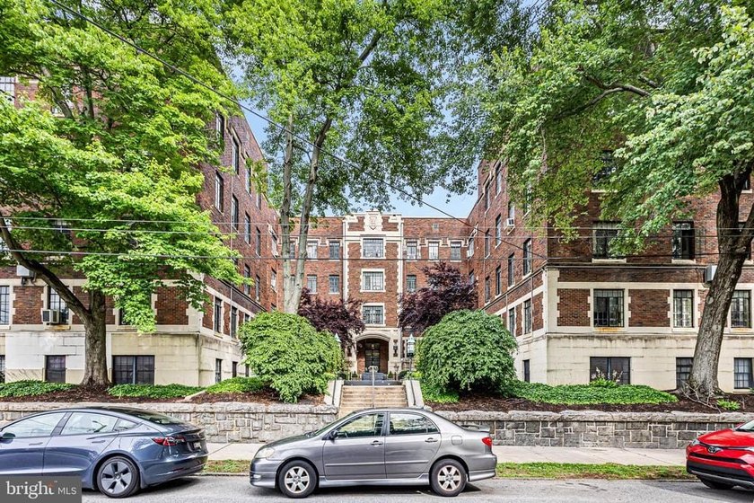 This corner unit is located on the top floor of the historic - photo 29