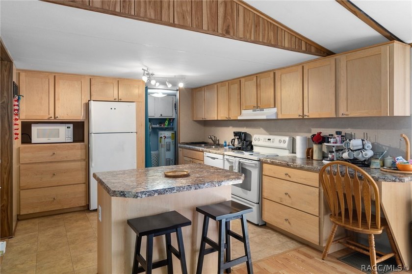 Welcome home to this charming 3-bedroom, 2-bathroom double wide - photo 2