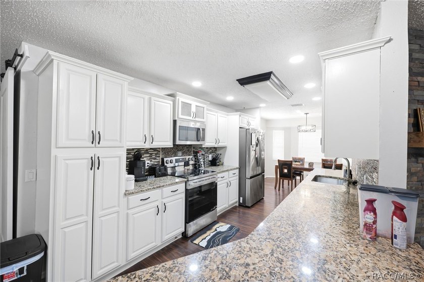 Situated on a 0.30-acre lot in the desirable Hills of Avalon - photo 9