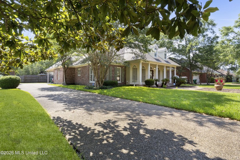 Welcome to this exceptional custom-built home nestled in the - photo 3