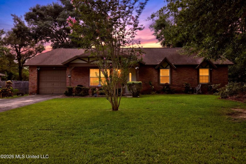 This charming all-brick 4-bedroom, 2-bath home has been lovingly - photo 2