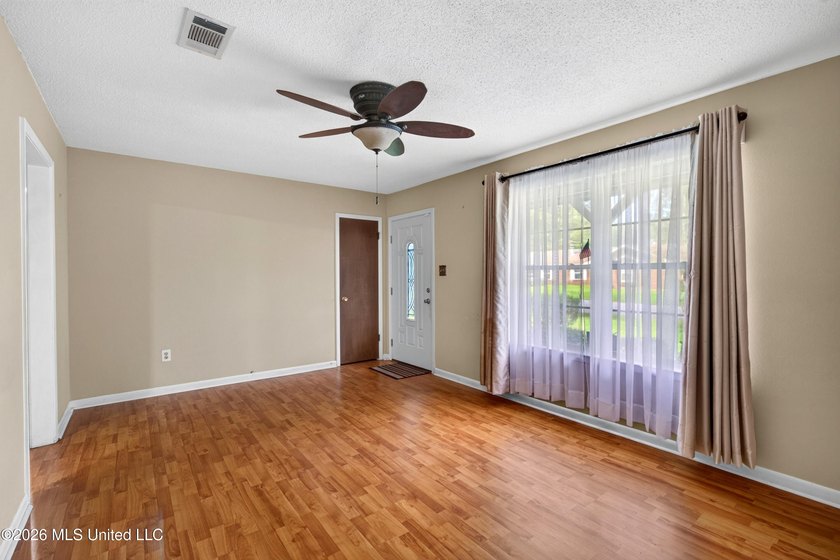This charming all-brick 4-bedroom, 2-bath home has been lovingly - photo 8
