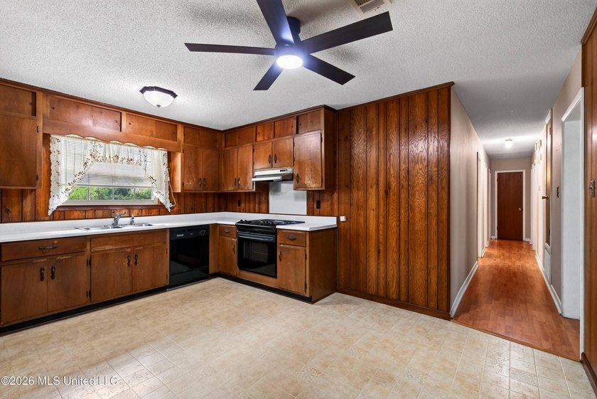 This charming all-brick 4-bedroom, 2-bath home has been lovingly - photo 10
