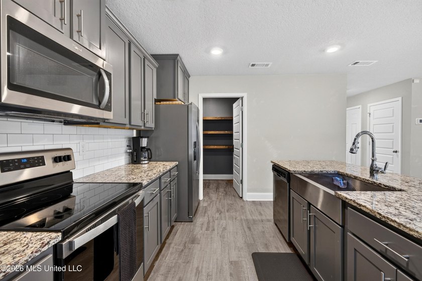 Modern design meets everyday convenience in this like-new - photo 14