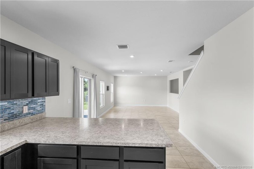 Move-in ready and beautifully maintained, this spacious - photo 8