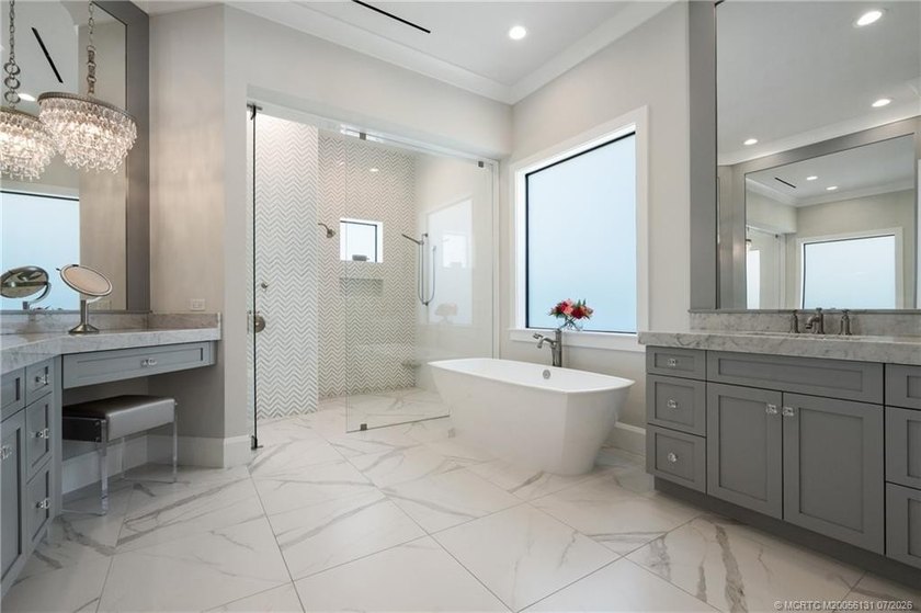 Welcome to this extraordinary waterfront estate in the gated - photo 6
