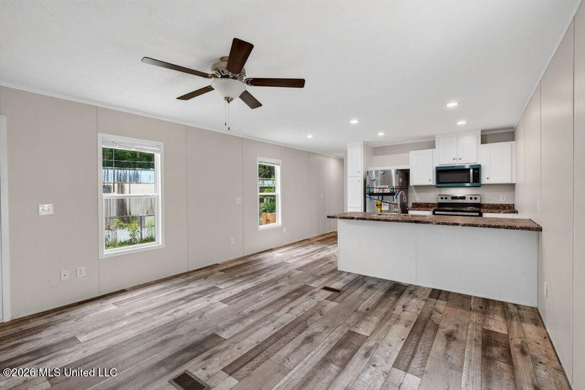 Brand new and never lived in! This beautiful 16' x 76' - photo 7