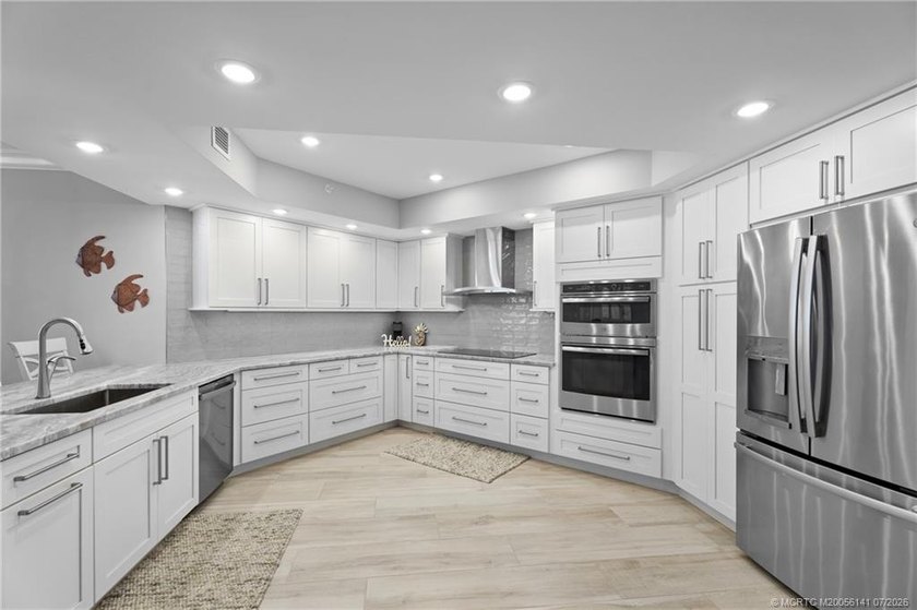 Completely updated from top to bottom with over $250,000 in - photo 7