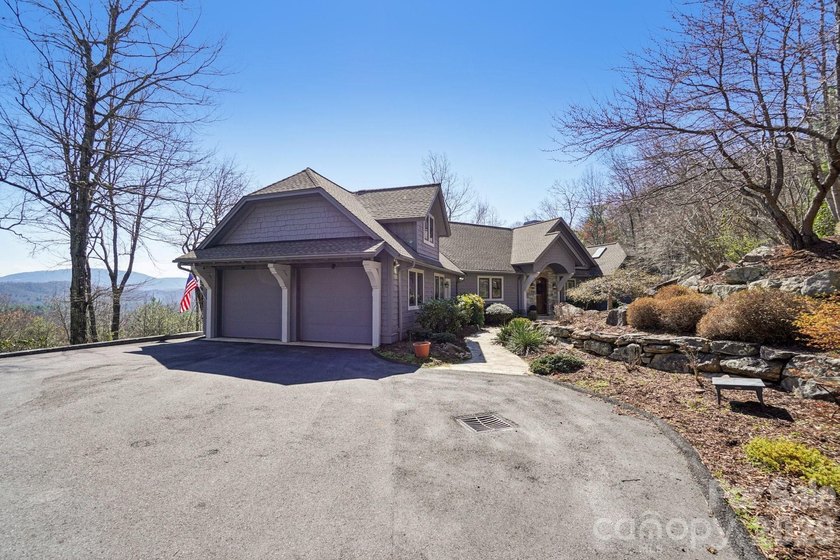 Experience elevated mountain living in this beautifully - photo 2