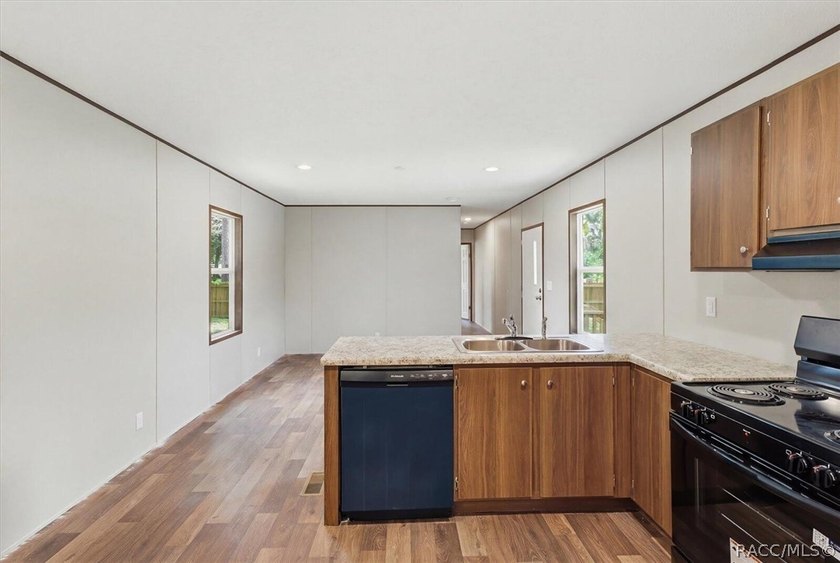 Brand-new mobile home on a spacious lot! Enjoy the perfect blend - photo 3