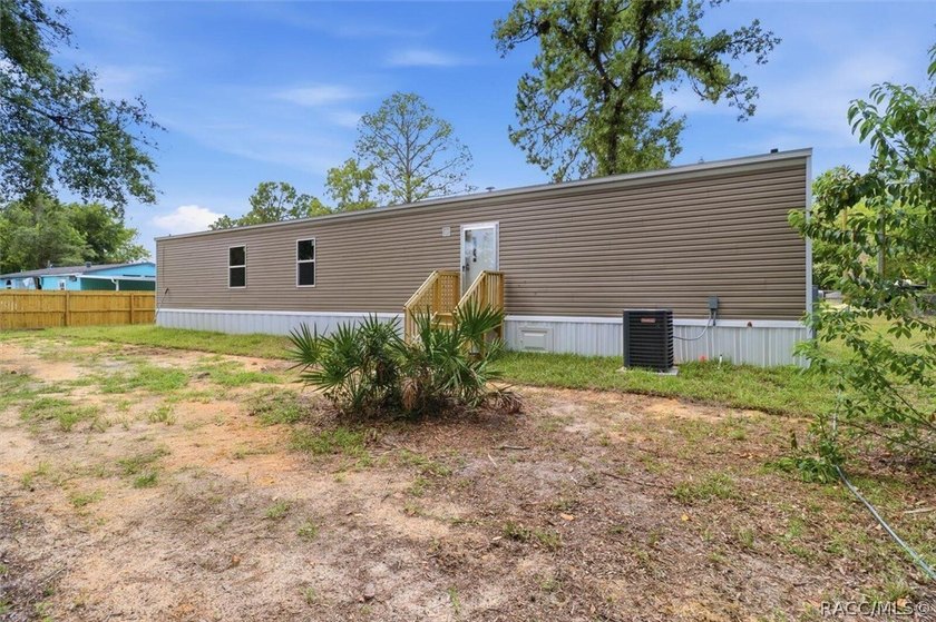 Brand-new mobile home on a spacious lot! Enjoy the perfect blend - photo 7