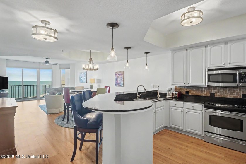 Enjoy beautiful sunset views over the beach from this 2 bedroom - photo 6