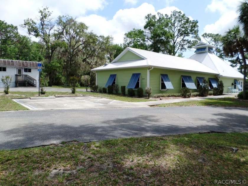 Situated centrally within the Rainbow Springs Community, this - photo 5