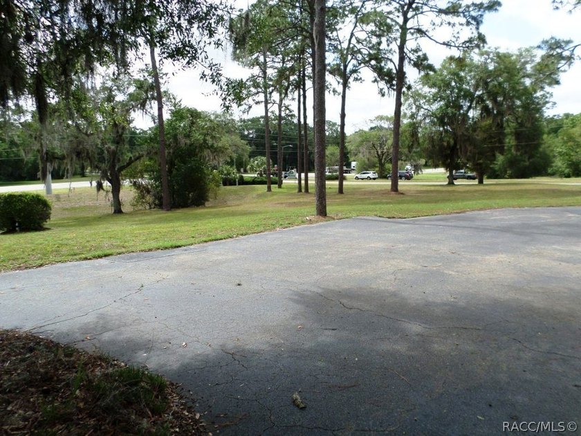 Situated centrally within the Rainbow Springs Community, this - photo 7