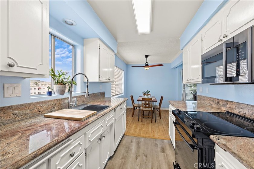 Experience the best of coastal urban living in this beautifully - photo 10