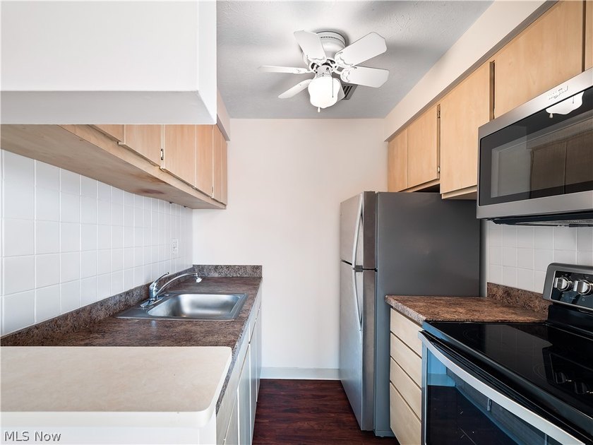 Welcome home to Kirtland House! Located in the heart of vibrant - photo 19