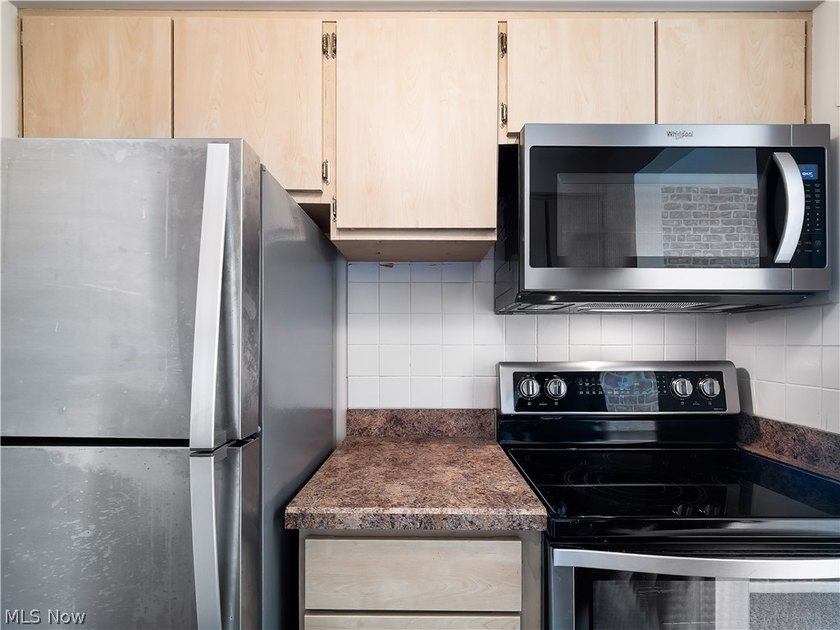 Welcome home to Kirtland House! Located in the heart of vibrant - photo 21