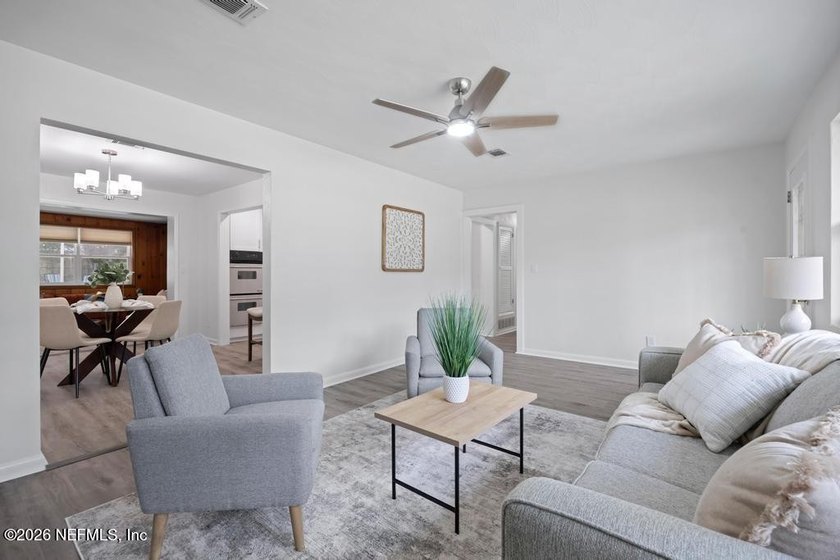 Welcome home to this inviting 3-bedroom, 2-bath pool home - photo 5