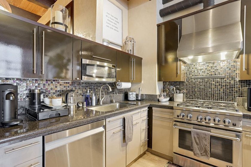 This meticulously remodeled loft captures the essence of the - photo 11