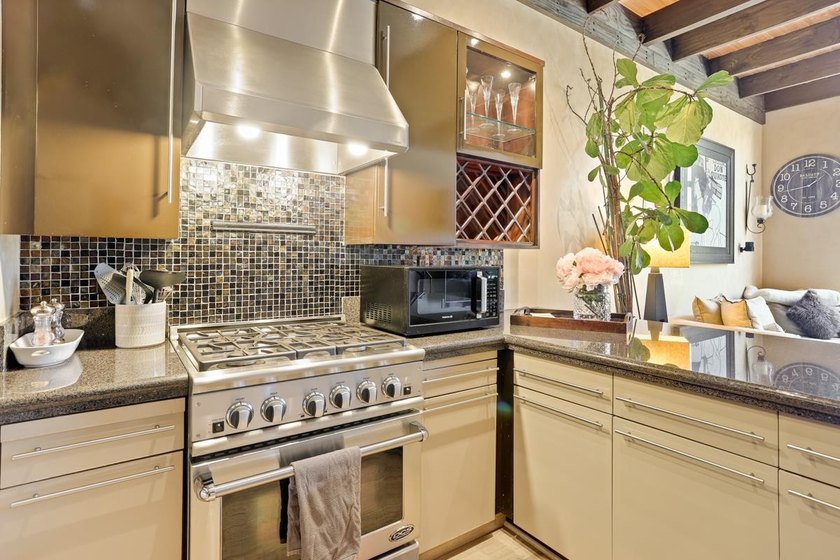 This meticulously remodeled loft captures the essence of the - photo 12
