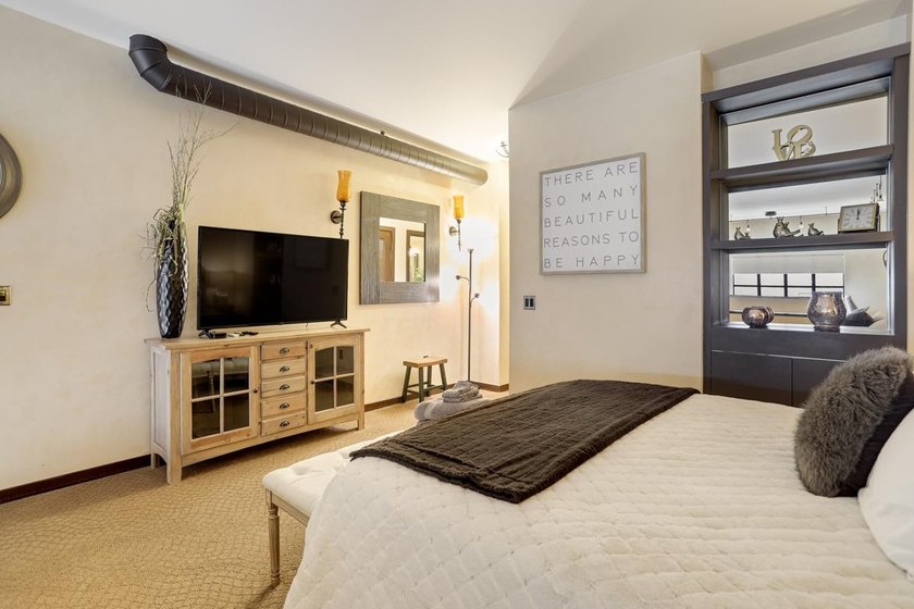 This meticulously remodeled loft captures the essence of the - photo 15