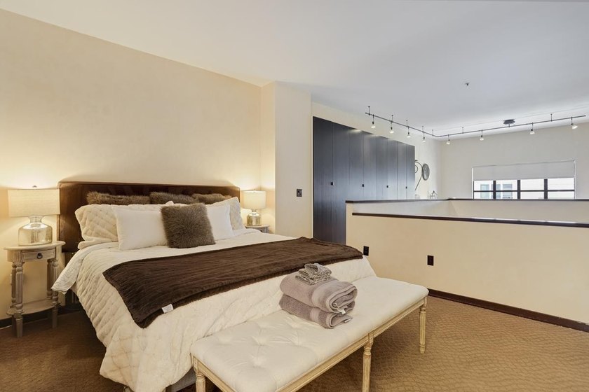 This meticulously remodeled loft captures the essence of the - photo 16