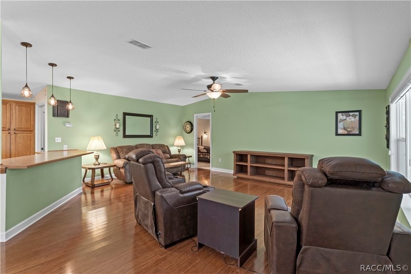 Tucked away on a beautiful wooded 1-acre waterfront lot in the - photo 9