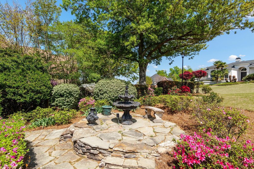 Welcome to this stunning 5-bedroom, 4.5-bath home located in the - photo 3