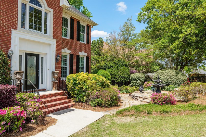 Welcome to this stunning 5-bedroom, 4.5-bath home located in the - photo 4
