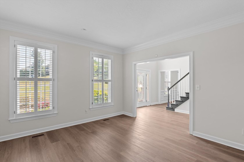 Welcome to this stunning 5-bedroom, 4.5-bath home located in the - photo 8