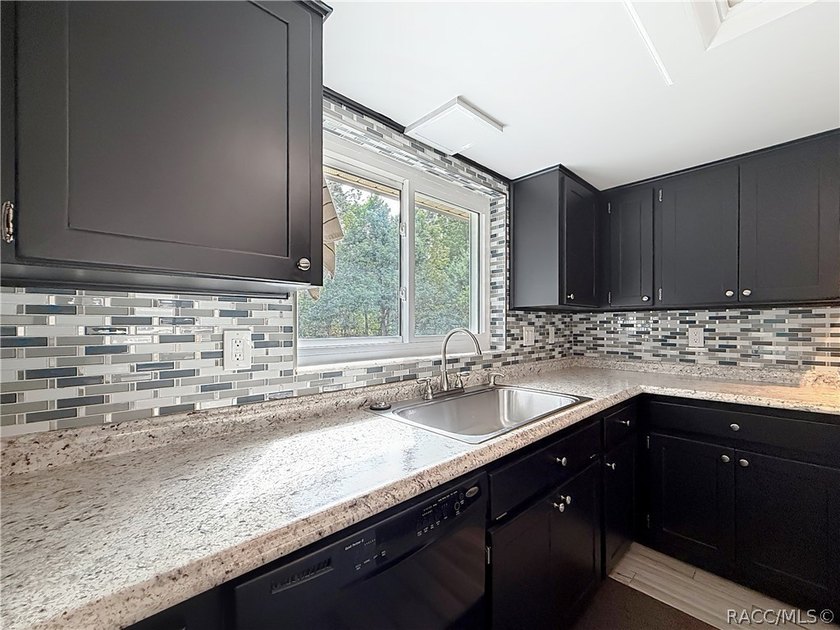 This updated 2-bedroom, 2-bathroom home at 11 Sweetgum Court - photo 9