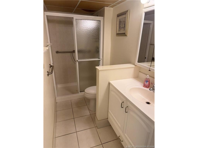 Great Opportunity to makes this 2/2 second floor condo in Miles - photo 9