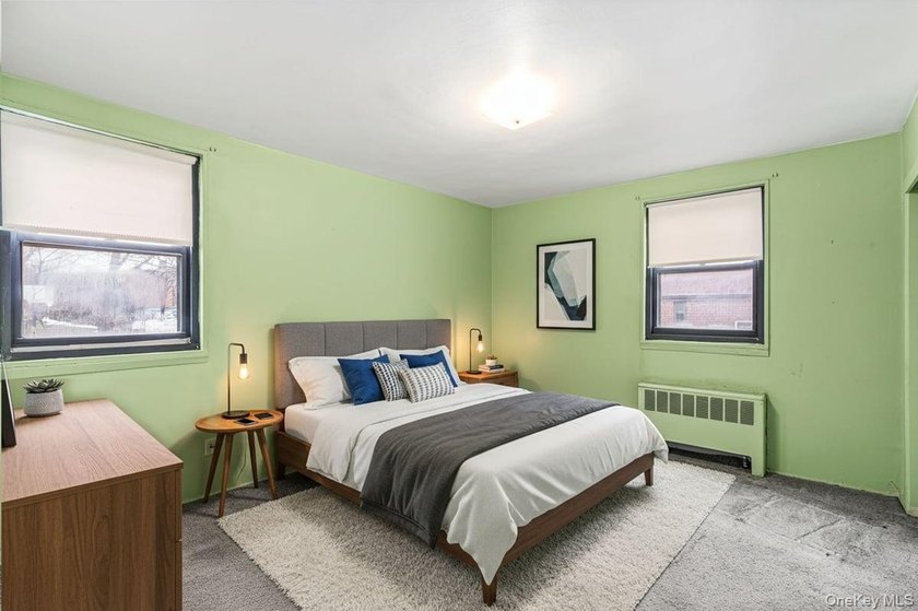 Welcome to this charming 2-bedroom, 1-bath garden apartment in - photo 12