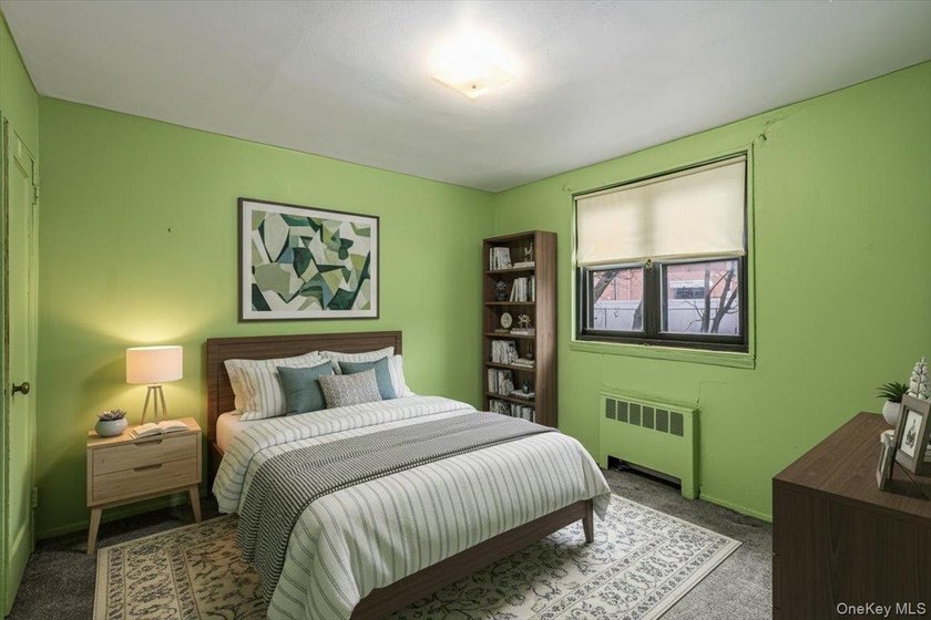 Welcome to this charming 2-bedroom, 1-bath garden apartment in - photo 15