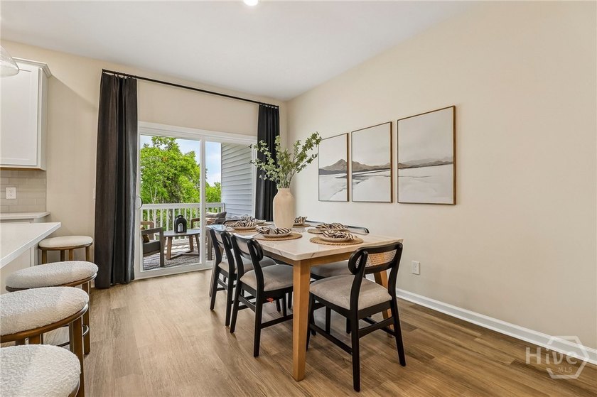 Welcome home to 22 Hidden pointe Drive! This three-story - photo 4