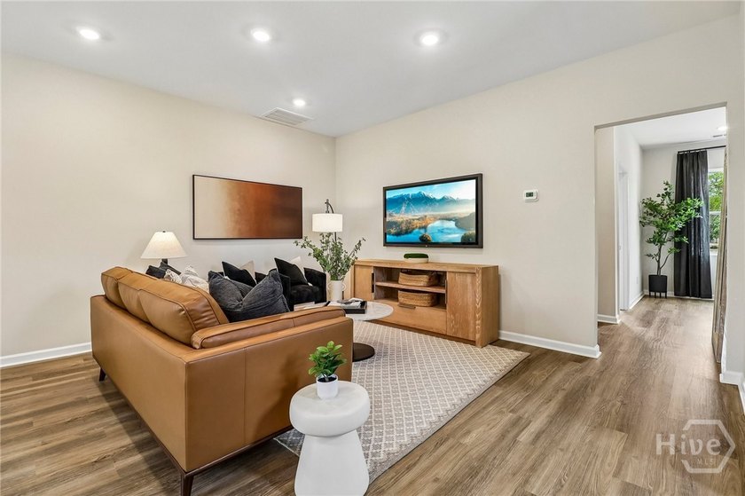 Welcome home to 22 Hidden pointe Drive! This three-story - photo 6